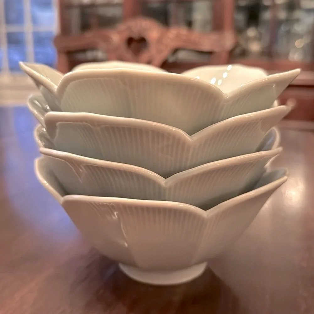 Set of four celadon lotus bowls